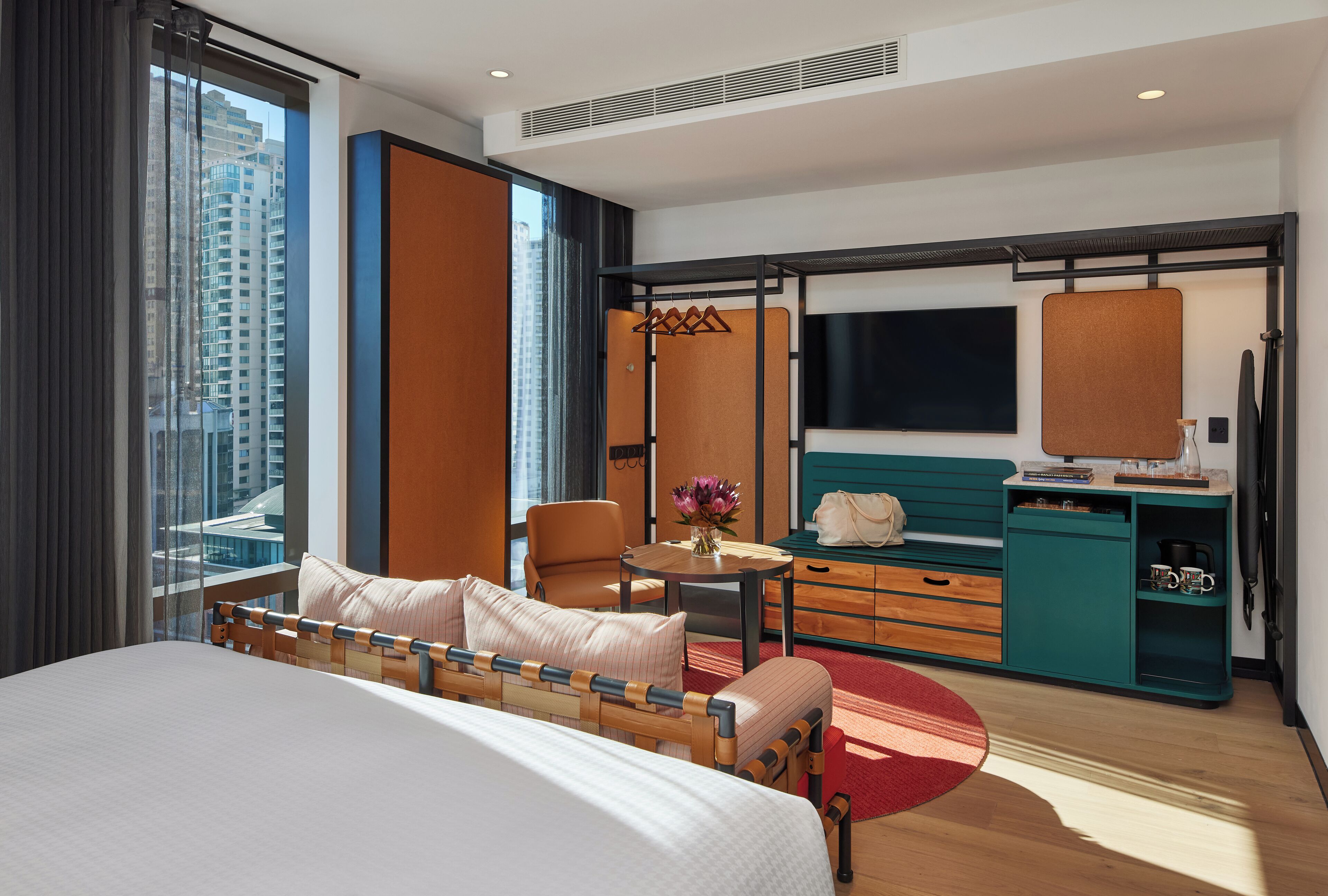 Premium bedding, desk, laptop workspace, soundproofing