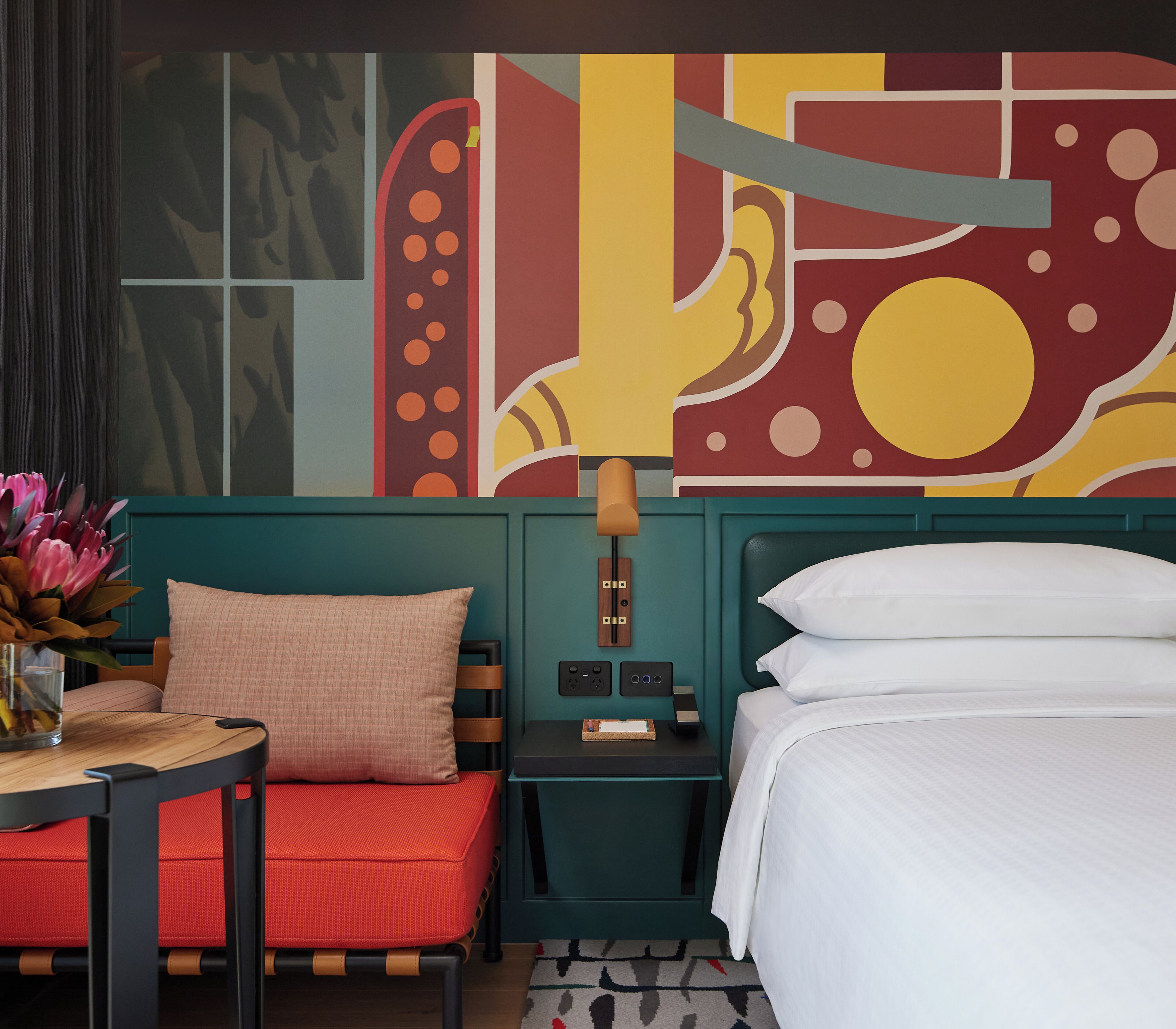 Premium bedding, desk, laptop workspace, iron/ironing board