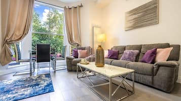 Deluxe Apartment, 3 Bedrooms, Ground Floor | Living area | Smart TV, streaming services