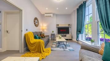 Apartamento exclusivo | Área de estar | Smart TV, serviços de streaming