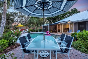 Outdoor dining - Resort-Style Pool & Spillover Spa • Game Room • Giant Chess • Mini Golf •AMI IMG (Bradenton)