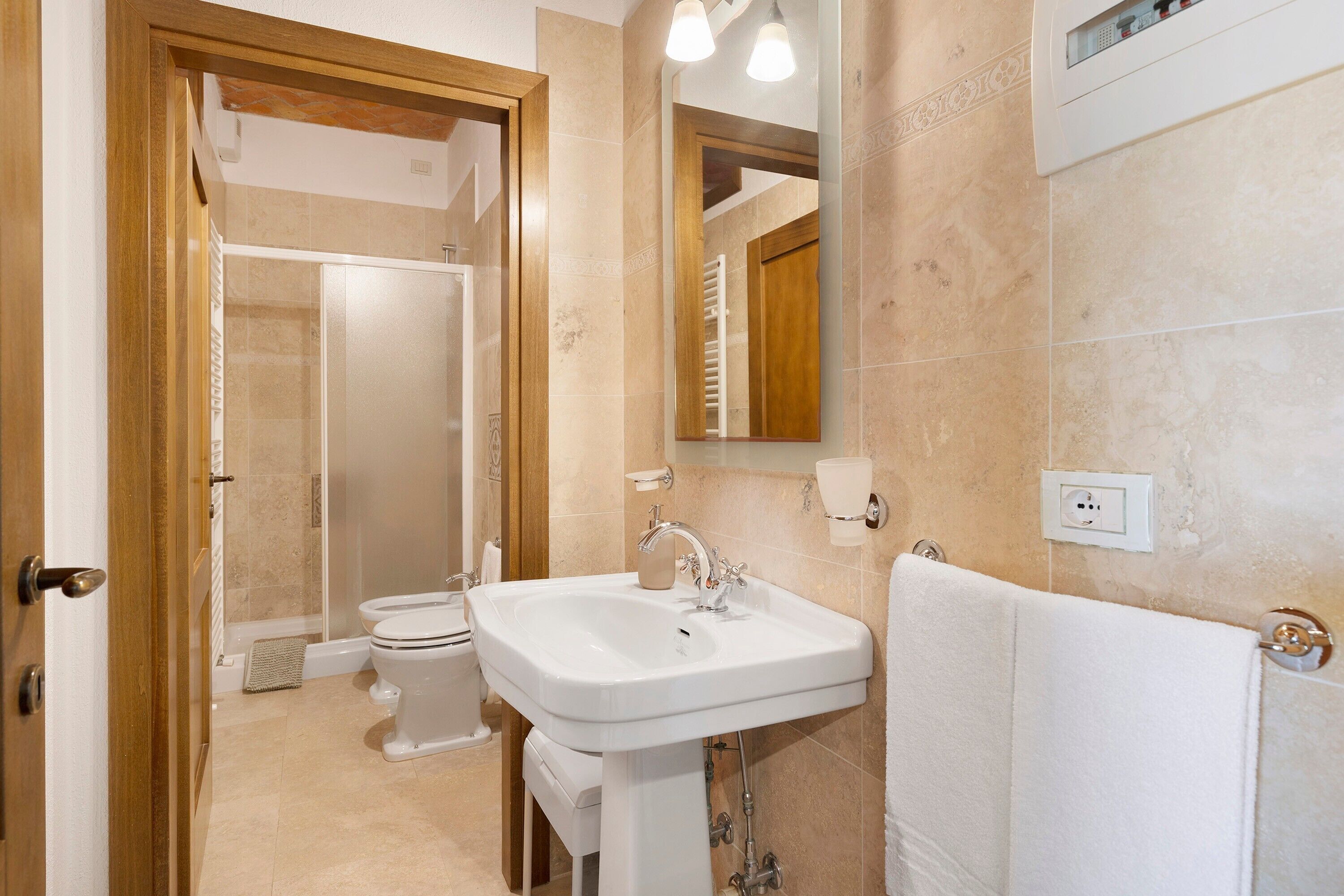 Shower, free toiletries, hair dryer, towels