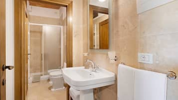 Shower, free toiletries, hair dryer, towels