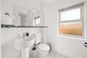 Regadera y secadora de cabello 