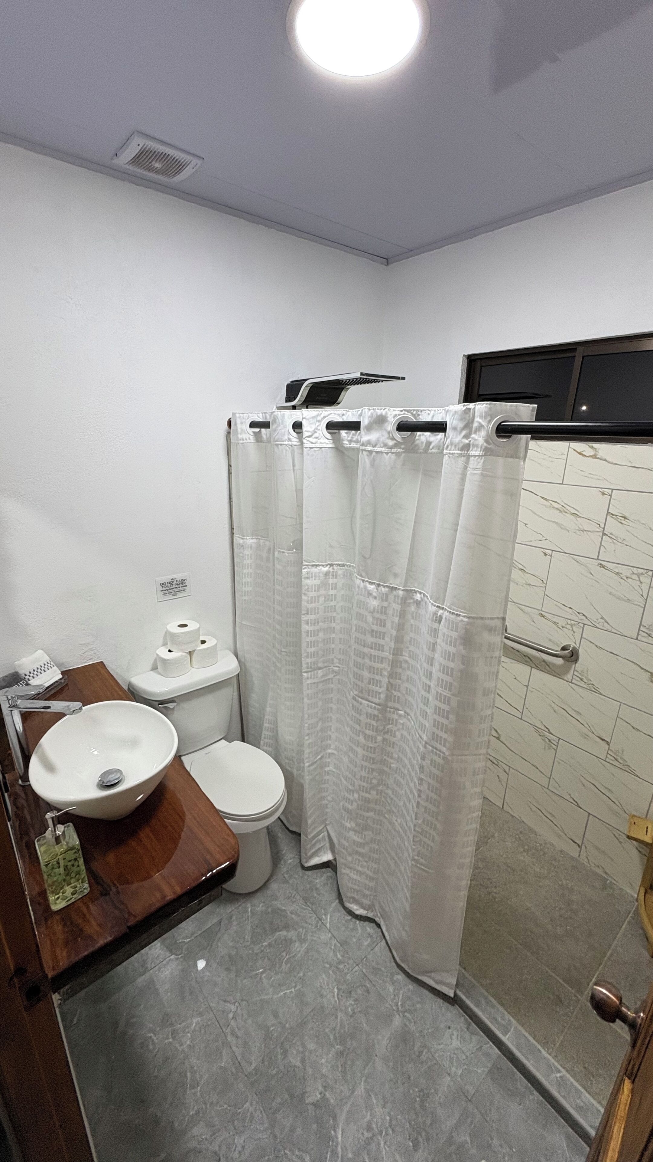 Hair dryer, towels, soap, toilet paper