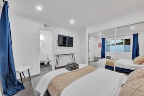4 bedrooms, iron/ironing board, travel cot, WiFi