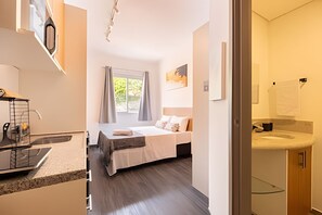 Fer et planche à repasser, draps fournis