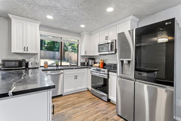 Fridge, microwave, oven, stovetop