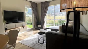 Appartement, plusieurs lits, patio, vue montagne (Castle View ) | Coin séjour