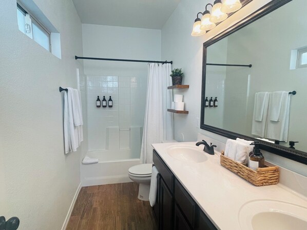 Hair dryer, towels, soap, toilet paper