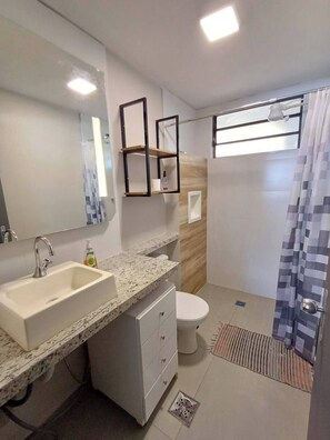 Hair dryer, towels, soap, shampoo