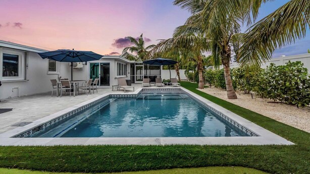 Unclassified image, 1 of 46, button - LivingGood by Duncan Real Estate (Holmes Beach)