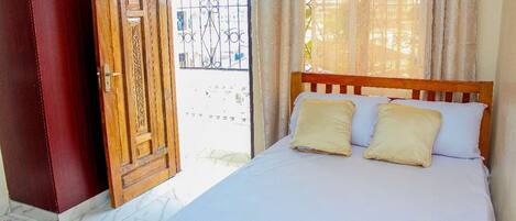 1 غرفة نوم ومكواة/لوح كي وواي فاي وملاءات أسرّة