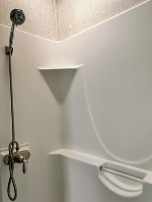 Shower, towels, soap, toilet paper
