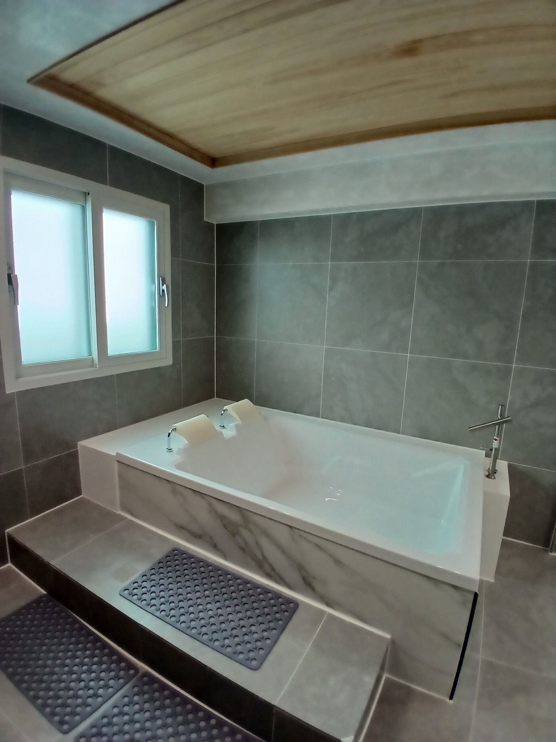 Family Special Spa Room, City View | Bathroom | Separate tub and shower, hair dryer, towels, soap