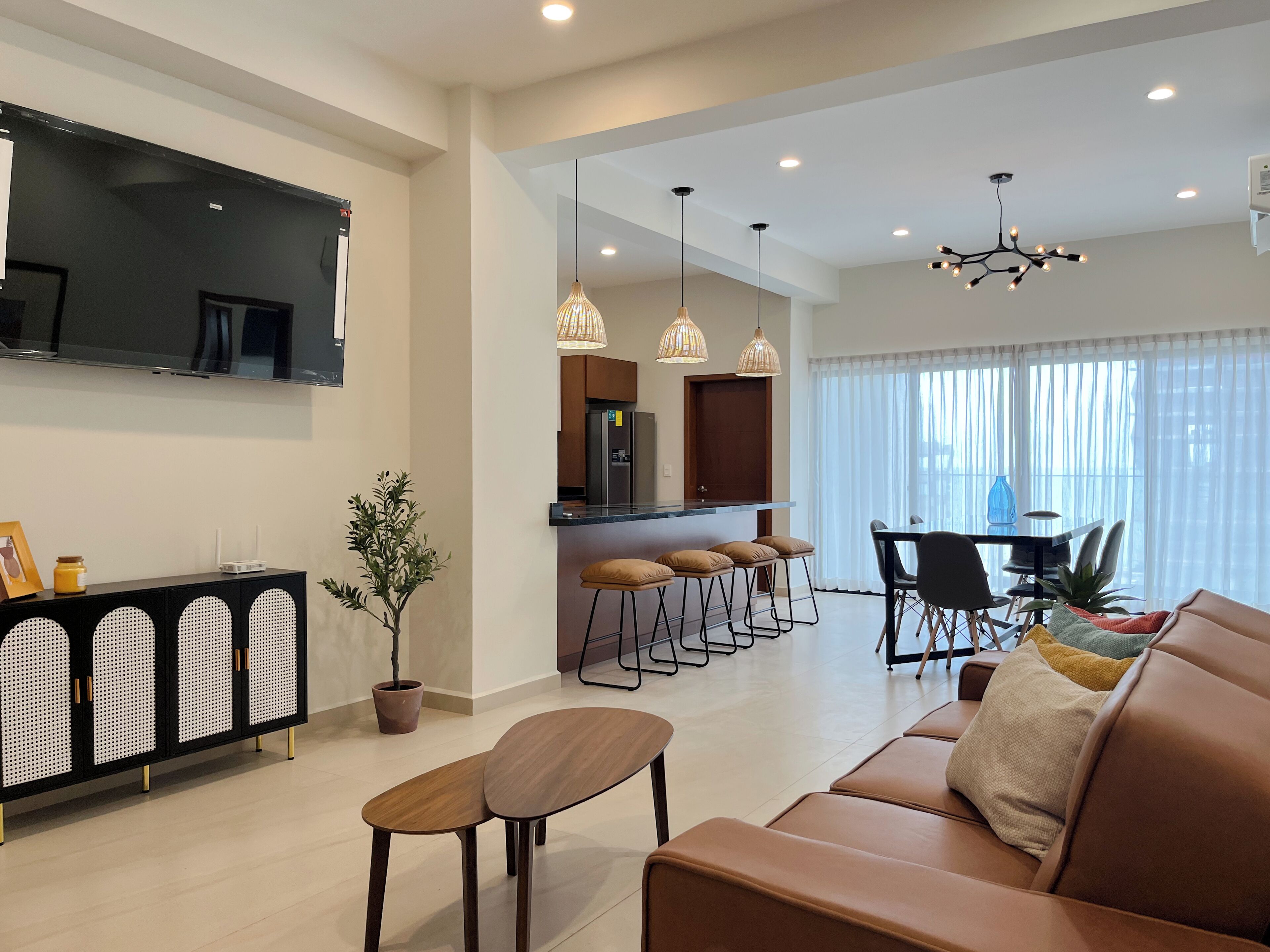 Comfort Apartment, Balcony, Partial Ocean View | Living area | 50-inch flat-screen TV with cable channels