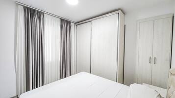 2 dormitorios, tabla de planchar con plancha, wifi y ropa de cama