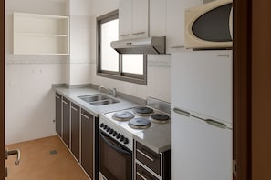 Apartment, 1 Bedroom, Non Smoking, Balcony | Private kitchen | Full-sized fridge, microwave, cookware/dishes/utensils