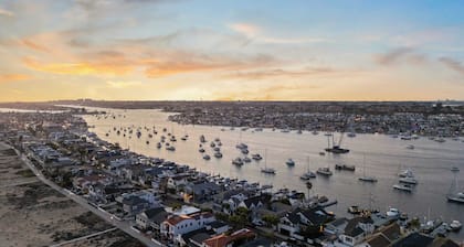 Oceanfront Home Walk to Balboa Pier + Scenic Views Balboa Peninsula Point by Avantstay