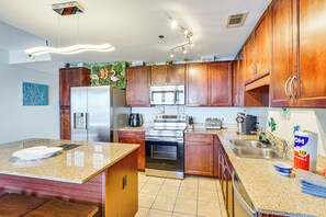 Fridge, microwave, stovetop, coffee/tea maker