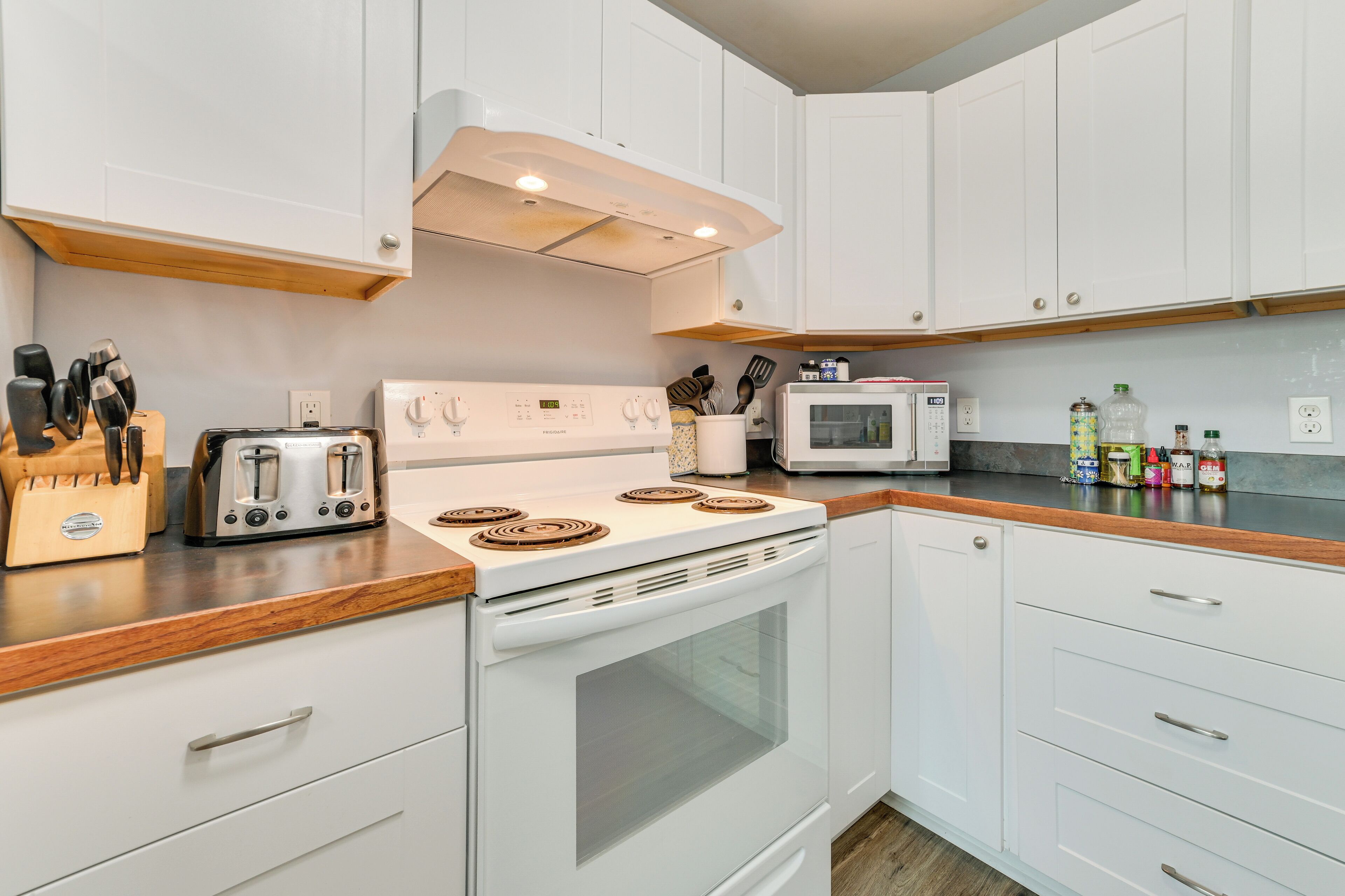 Fridge, microwave, stovetop, coffee/tea maker