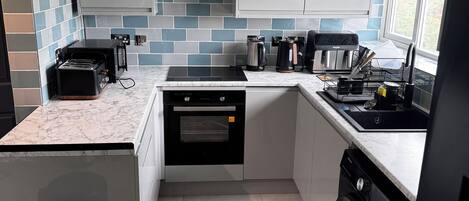 Microwave, oven, stovetop, cookware/dishes/utensils