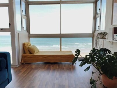 cute, sun-soaked apartment above the sea
