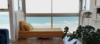 cute, sun-soaked apartment above the sea