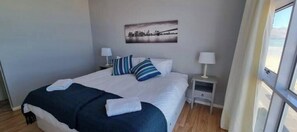 1 dormitorio, tabla de planchar con plancha, wifi gratis y ropa de cama