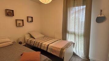 2 habitaciones, tabla de planchar con plancha y wifi