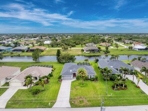 Exterior - Newly Remodeled 4BR/3BR Canal Front Retreat w/ Pool Near Golf Course & Beach FL (Rotonda West)