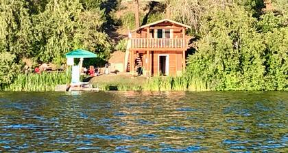 Cozy Cabin on Jump Off Joe Lake w/ Private Dock & Mt. Views- Rustic Ruby Retreat