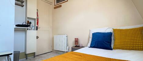 1 habitación y ropa de cama