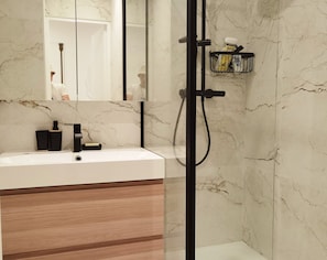 Shower, hair dryer, towels, soap