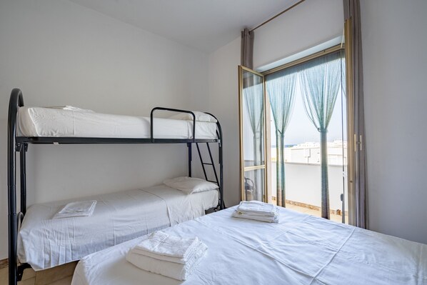 2 bedrooms, travel crib, WiFi, bed sheets