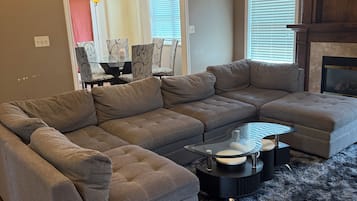 TV, fireplace, books