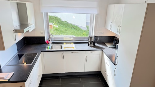 130 sqm apartment with garden and parking space