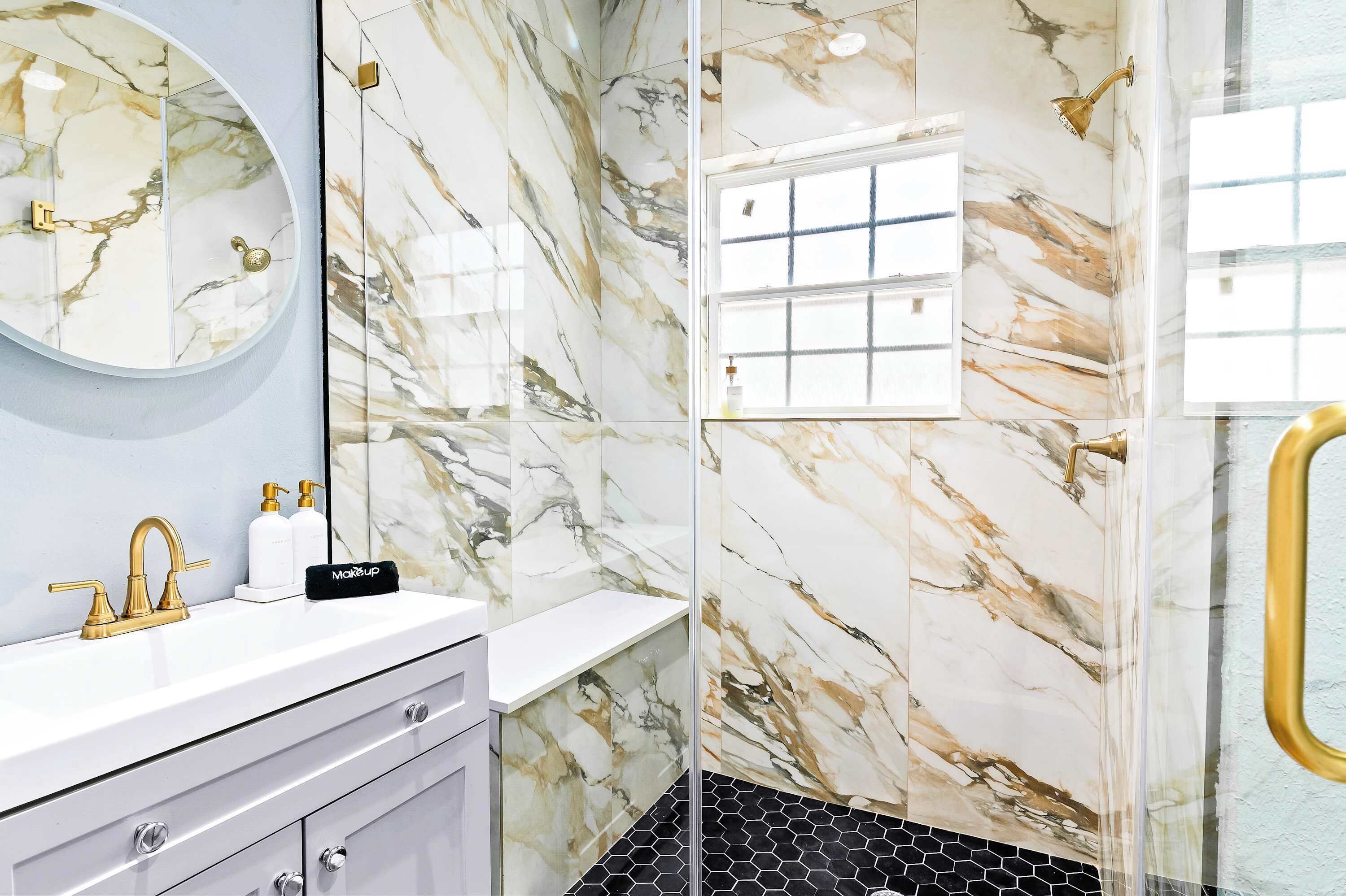Shower, hair dryer, towels, shampoo