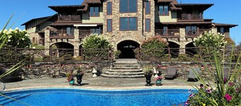 Stunning Modern Artistically Crafted Lodge. 50 pristine acres with 9ac pond/pool