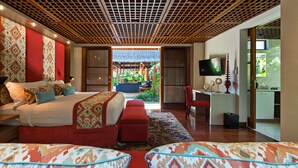 A modern bedroom with a large bed, a desk, and a TV. - Beautiful 5 Star Villa in a Prime Location in Seminyak, Bali Villa 2129 (Bali)