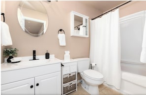 Hair dryer, towels, soap, shampoo