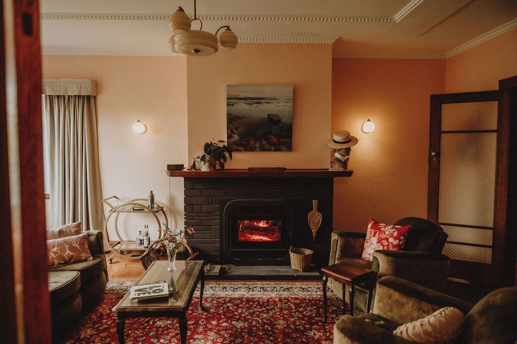 TV, fireplace, books