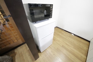 Mini-fridge, microwave, cookware/dishes/utensils