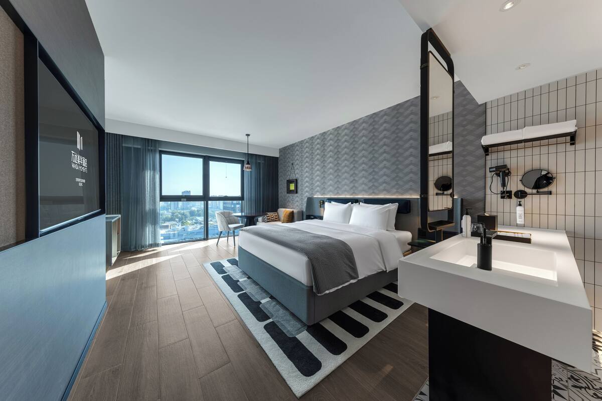Kamar Single Standar | Tirai kedap cahaya, setrika/meja setrika, dan tempat tidur bayi gratis