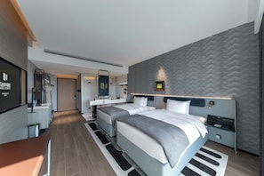 Standard Twin Room | Blackout drapes, iron/ironing board, free cribs/infant beds, bed sheets