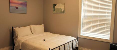 2 habitaciones, tabla de planchar con plancha y wifi gratis