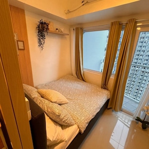 Deluxe Condo, 1 Bedroom, Balcony, Pool View | Blackout drapes, iron/ironing board, free WiFi, wheelchair access