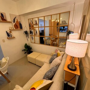 Deluxe Condo, 1 Bedroom, Balcony, Pool View | Living area