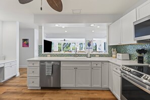 Fridge, microwave, dishwasher, coffee/tea maker