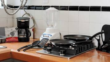 Fridge, microwave, stovetop, coffee/tea maker